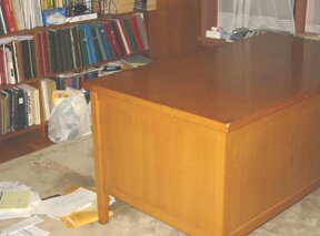 Dad's desk, empty and clean.