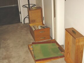 Dad's desk drawers in the hallway.